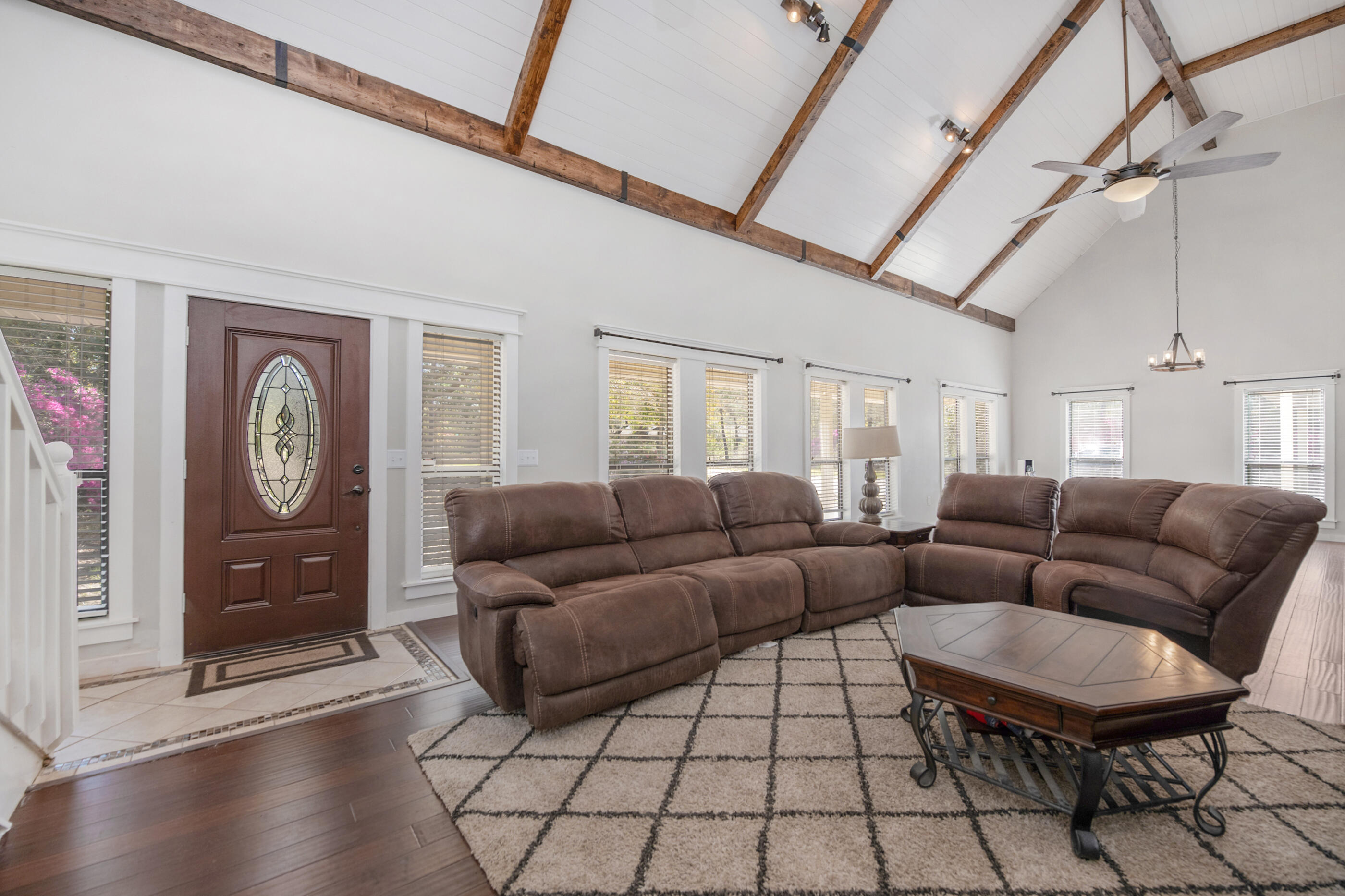 6539 Robar Tesora Street Navarre, FL 32566 - Photo 8 of 48 a living room with furniture and a window
