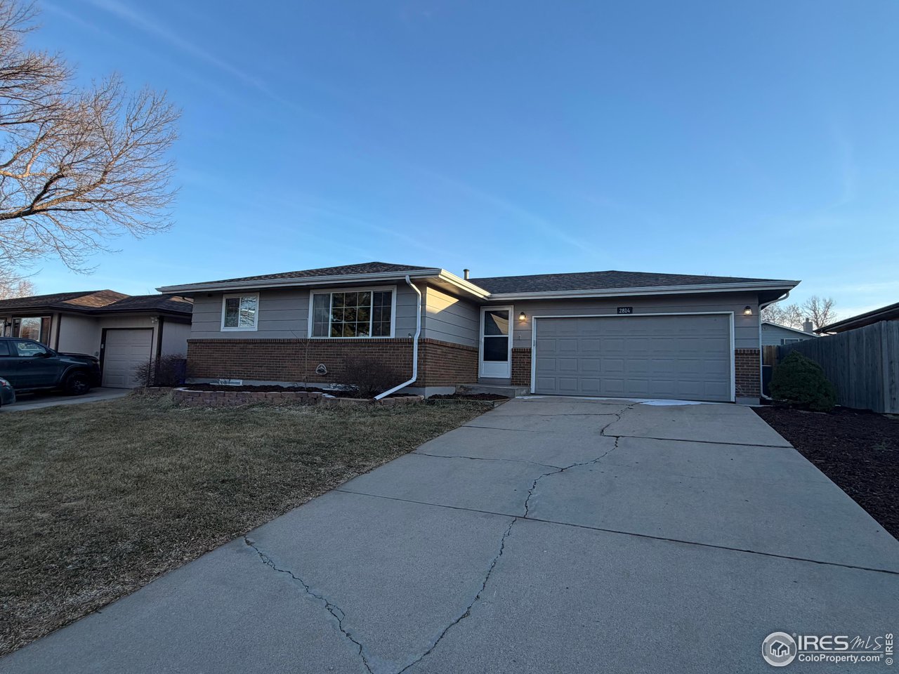 a house view with a backyard space