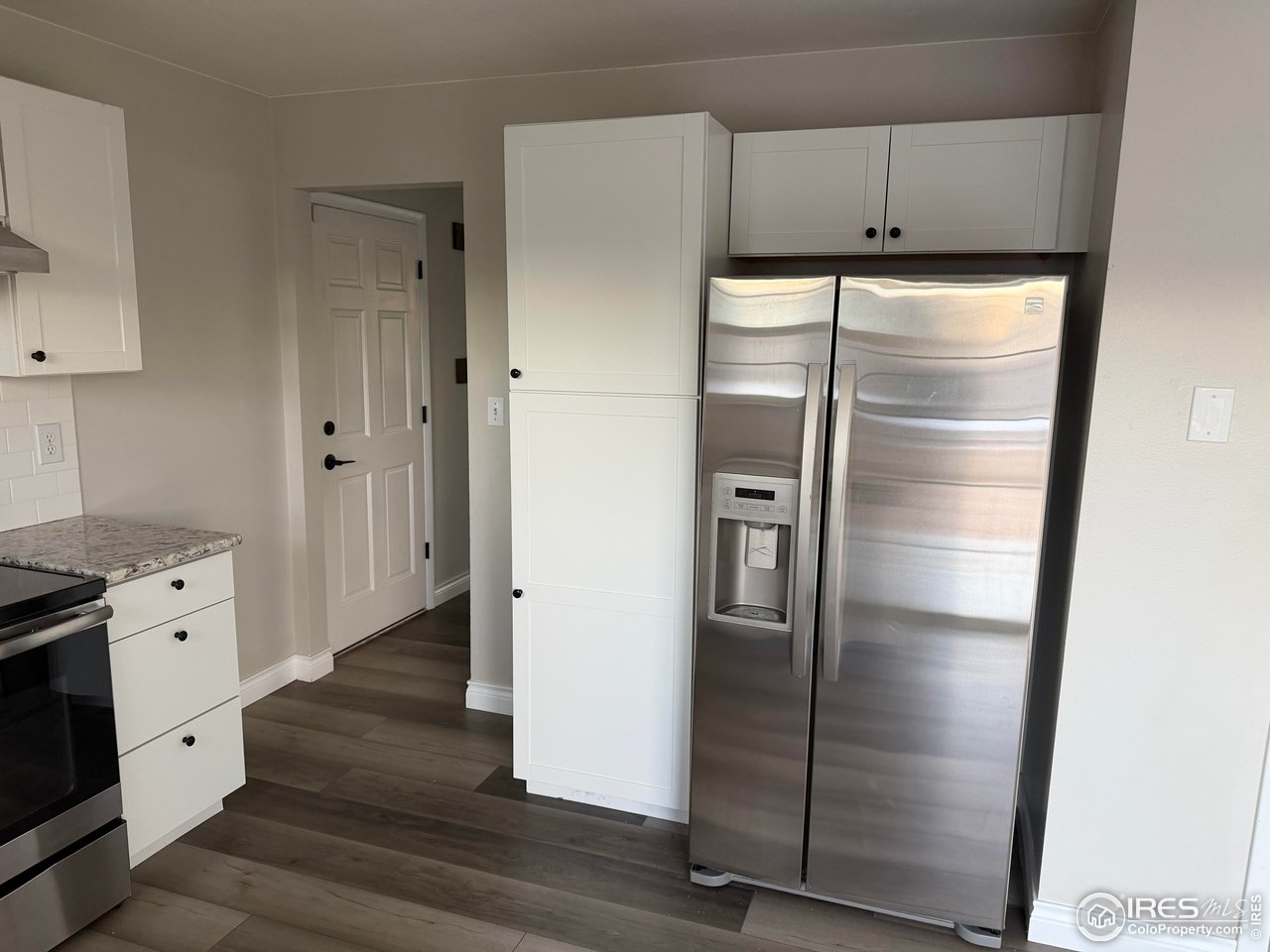 2814 West 22nd Street Road Greeley, CO 80634 - Photo 5 of 27 Recently remodeled kitchen with stainless steel appliances and granite countertops