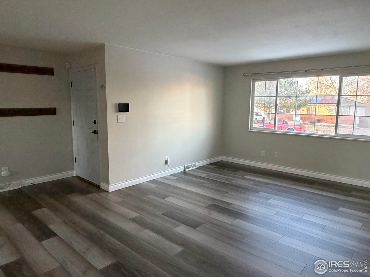 2814 West 22nd Street Road Greeley, CO 80634 - Photo 9 of 27 Living room with large window