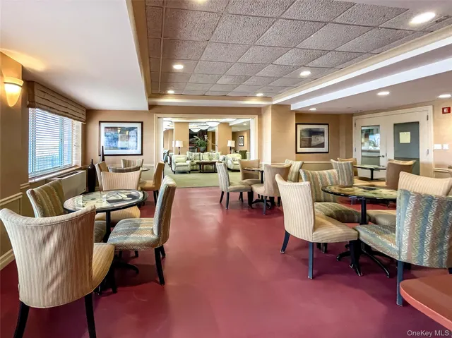 a view of a workspace with furniture