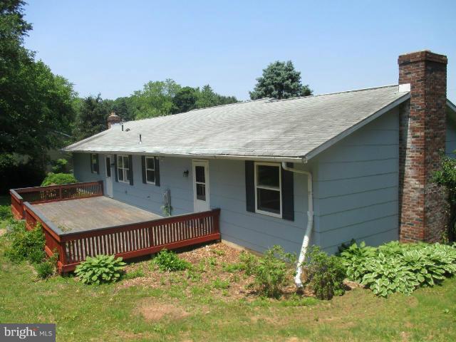1712 Oakmont Road Fallston, MD 21047 - Photo 22 of 23 a view of a house with a yard and potted plants