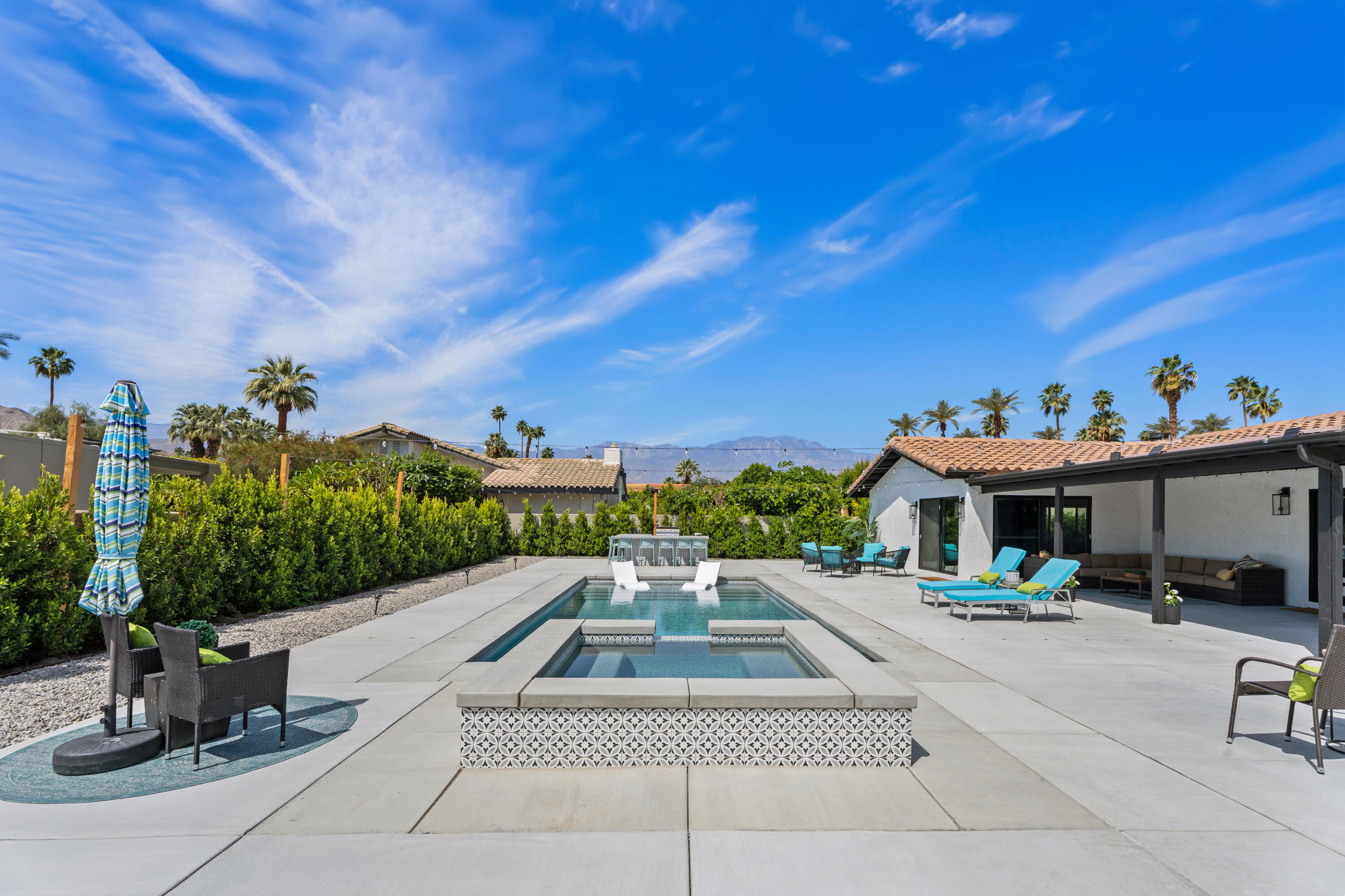 70443 Chappel Road Rancho Mirage, CA 92270 - Photo 1 of 36 a view of a street with houses