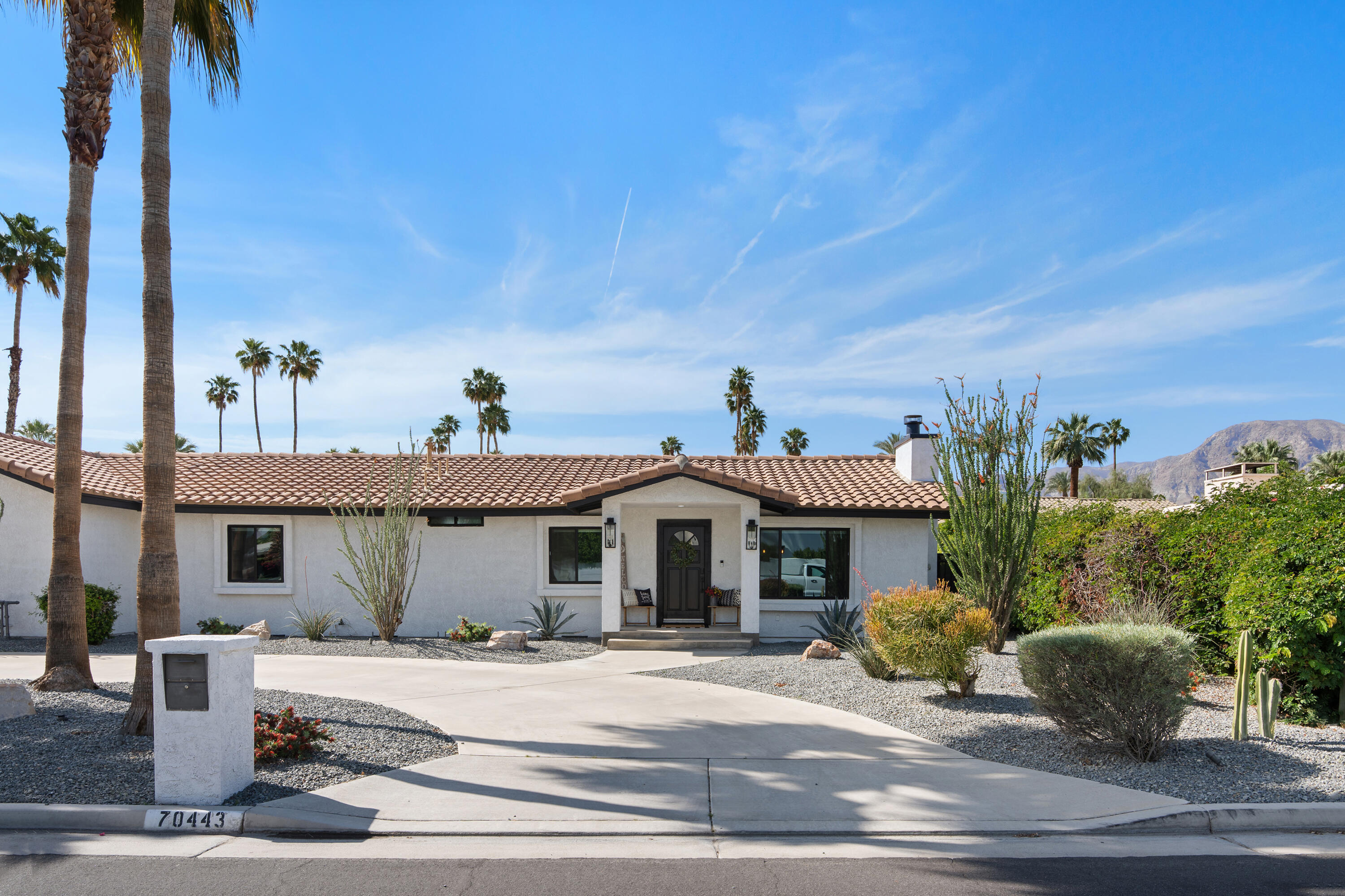 70443 Chappel Road Rancho Mirage, CA 92270 - Photo 29 of 36 a front view of a house with a yard