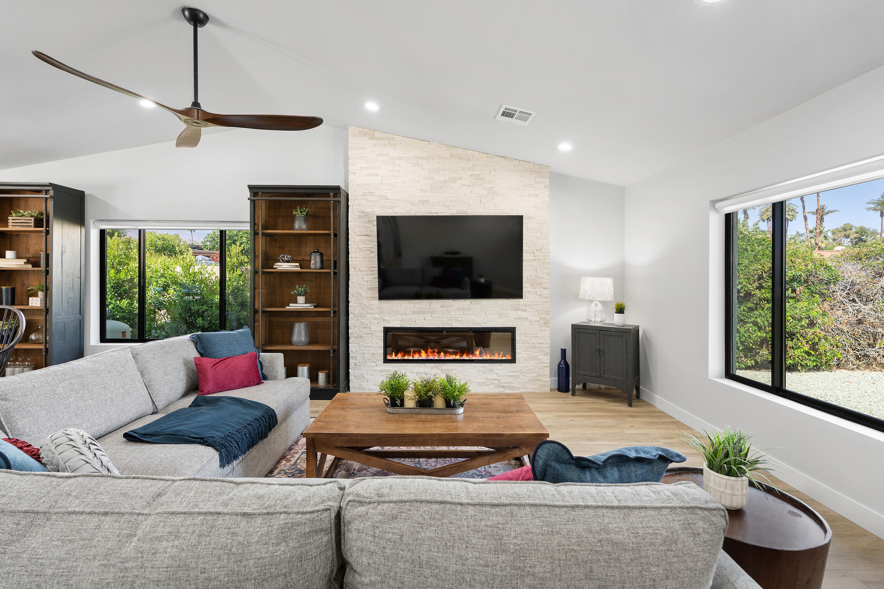 70443 Chappel Road Rancho Mirage, CA 92270 - Photo 10 of 36 a living room with furniture and a flat screen tv