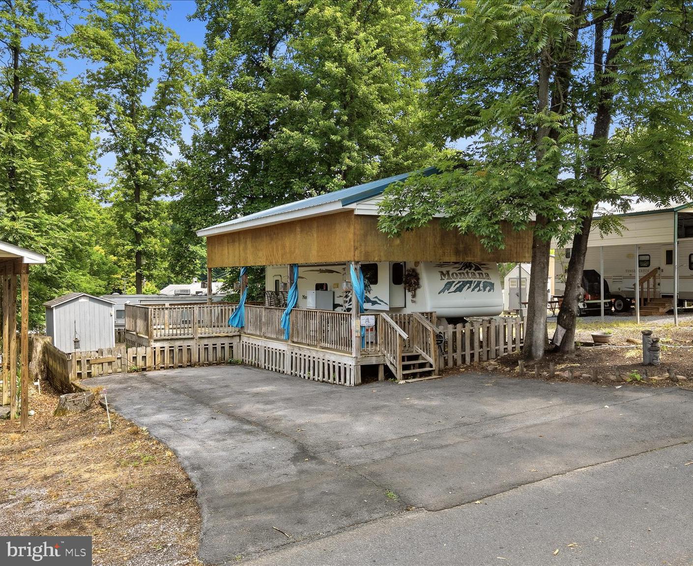 Lot 20 Hot Dog Road Falling Waters, WV 25419 - Photo 2 of 26 a view of a house with a patio and a yard