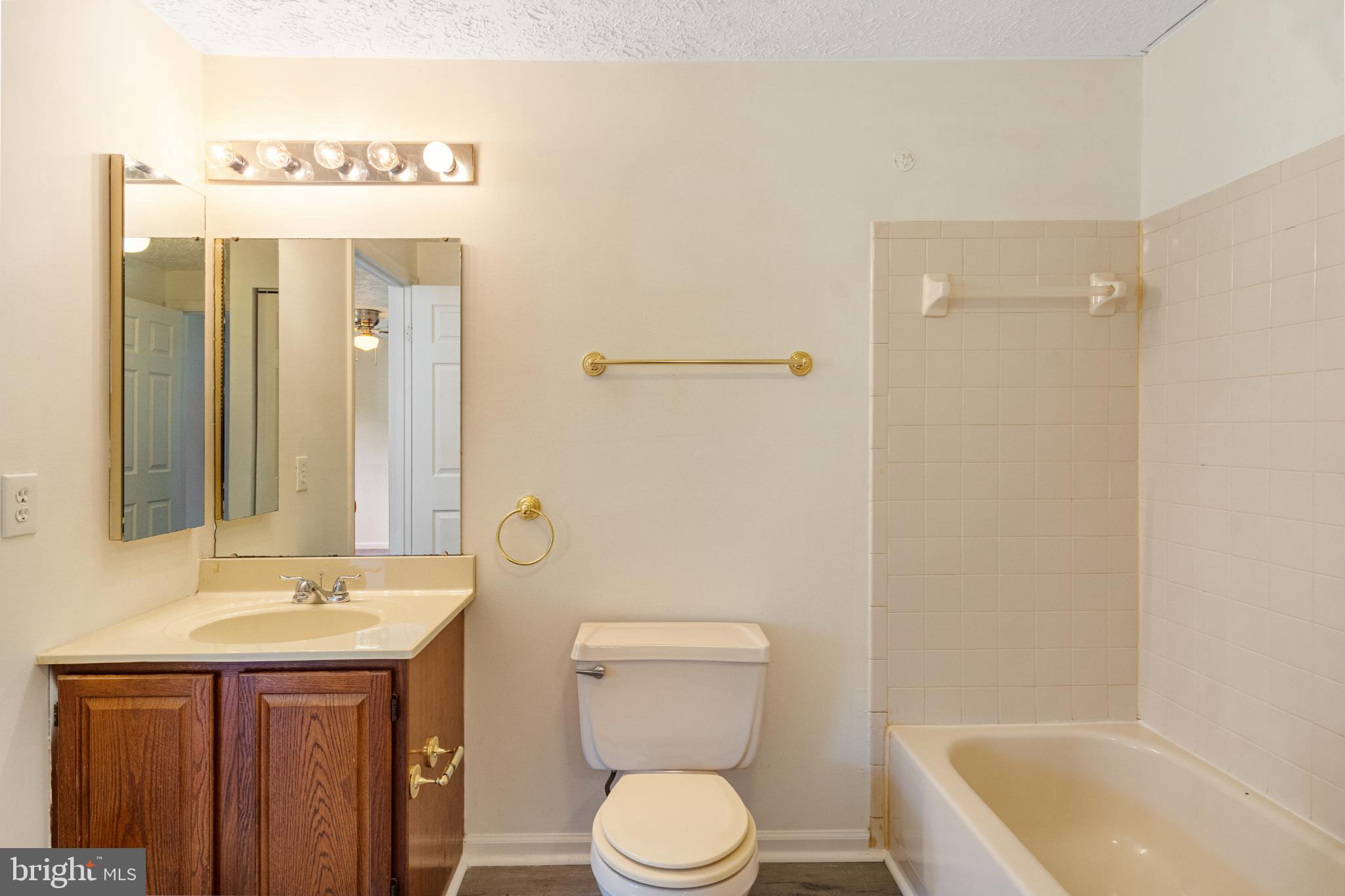3322 Raccoon Court Abingdon, MD 21009 - Photo 26 of 44 a bathroom with a sink a toilet and shower