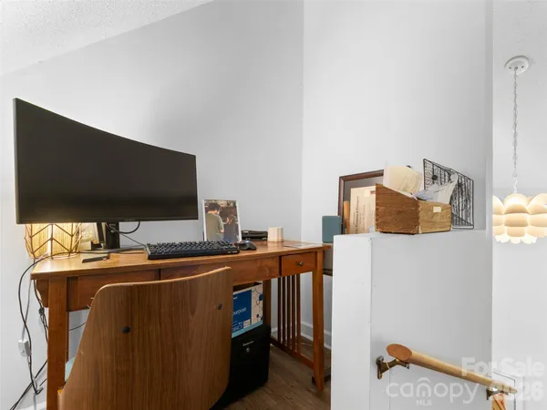 a room with furniture and a flat screen tv