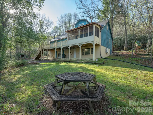 a view of a yard with furniture