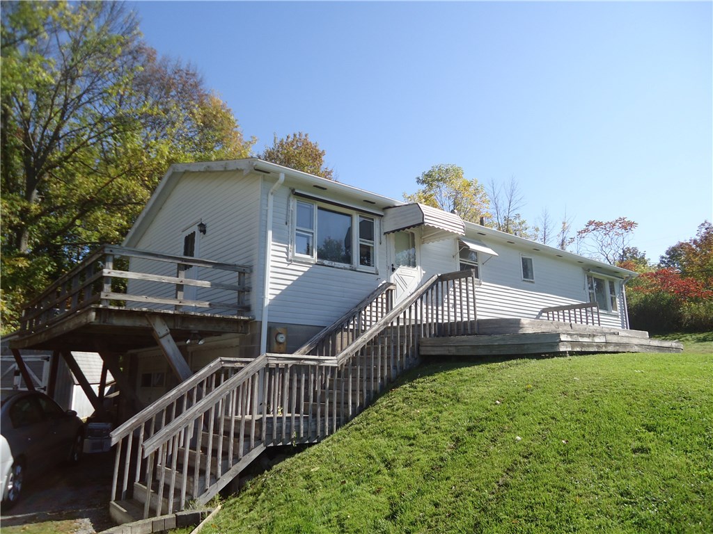 5271 East Lake Road Livonia, NY 14487 - Photo 1 of 1 Entry from driveway to the open front deck/poch OR