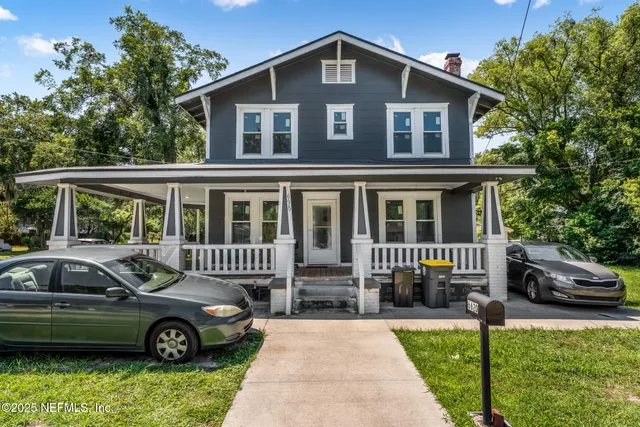 a car parked in front of a house