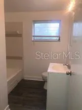 a bathroom with a sink and a vanity