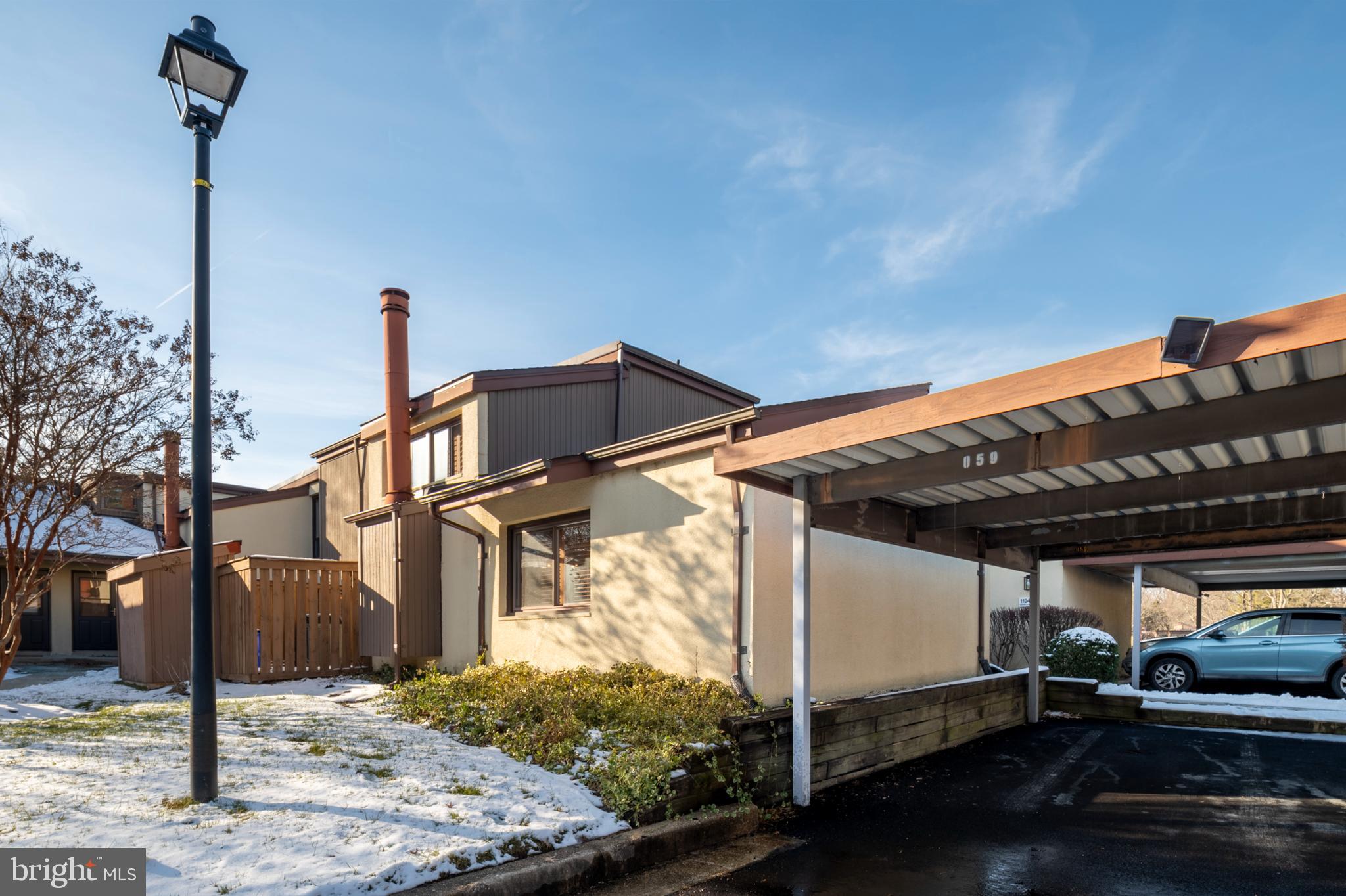 11246 Snowflake Court, Unit A121 Columbia, MD 21044 - Photo 2 of 36 a view of a house with street