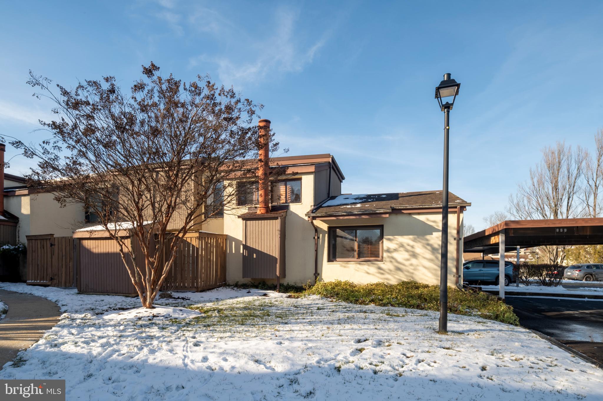 11246 Snowflake Court, Unit A121 Columbia, MD 21044 - Photo 32 of 36 a view of a house with a tree
