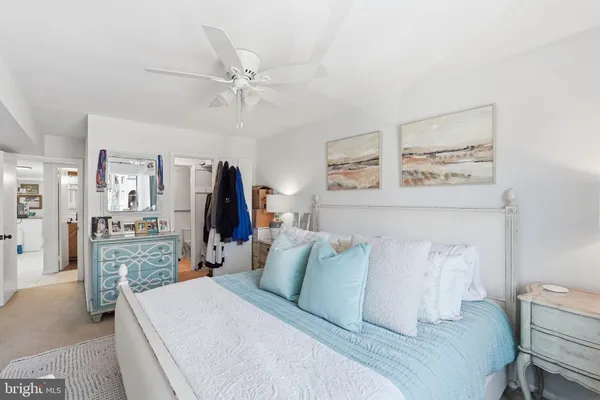 a bed room with a bed and a walk in closet