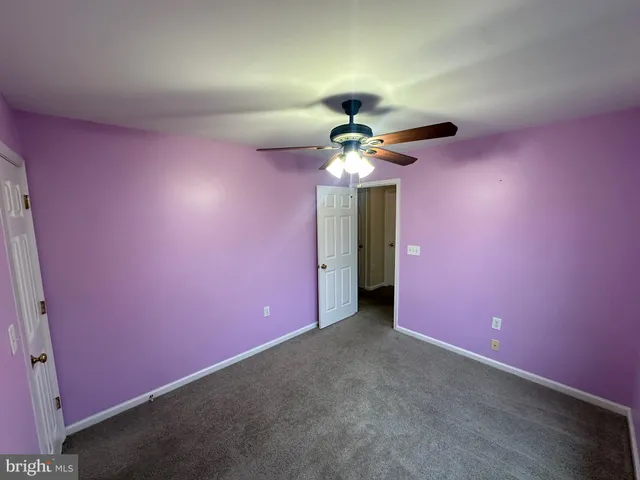a view of a livingroom with a fan