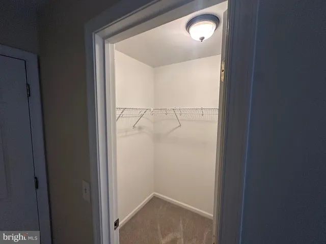 a bathroom with a tub and a sink