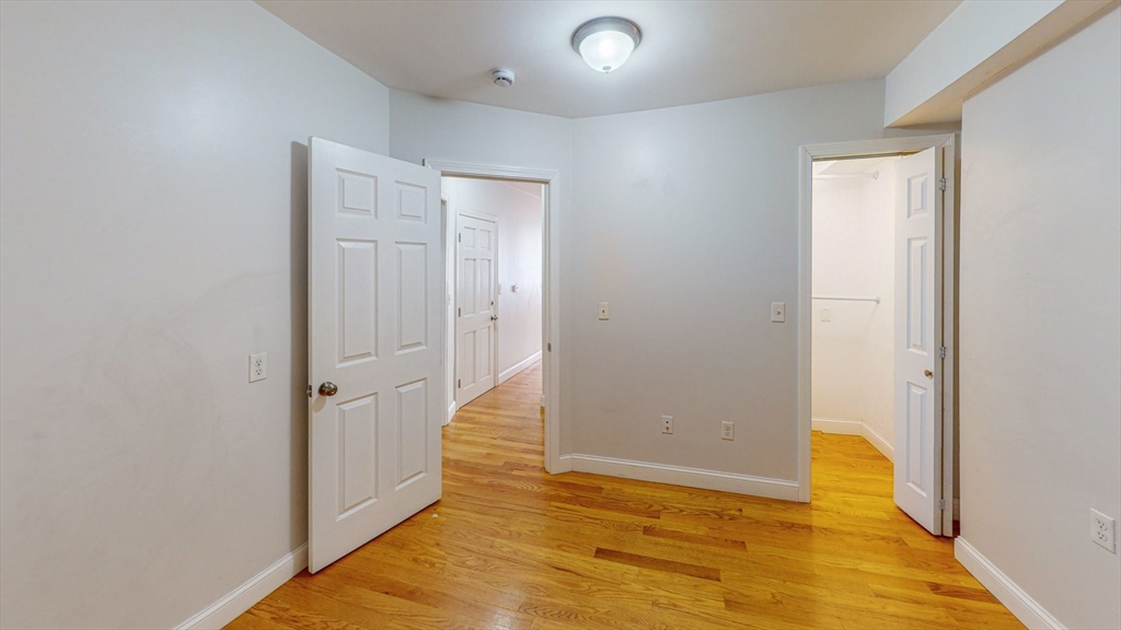 67 Marion Street, Unit 2 Boston, MA 02128 - Photo 10 of 15 a view of wooden floor