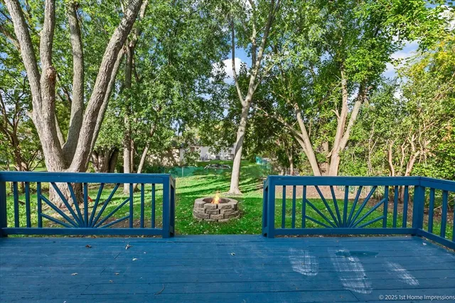 a view of a deck with a yard