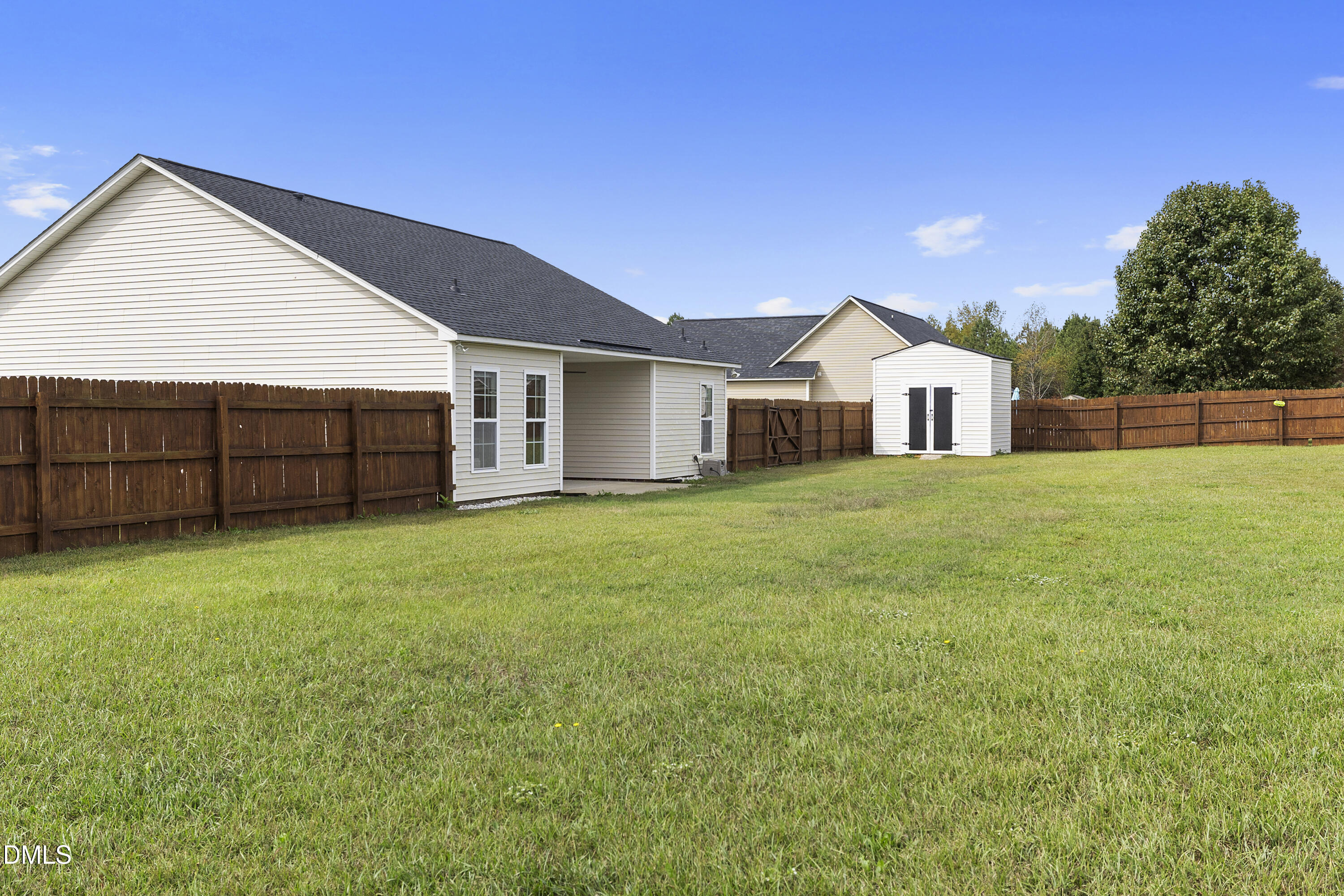 298 Declaration Drive Raeford, NC 28376 - Photo 13 of 58 a view of a house with a backyard