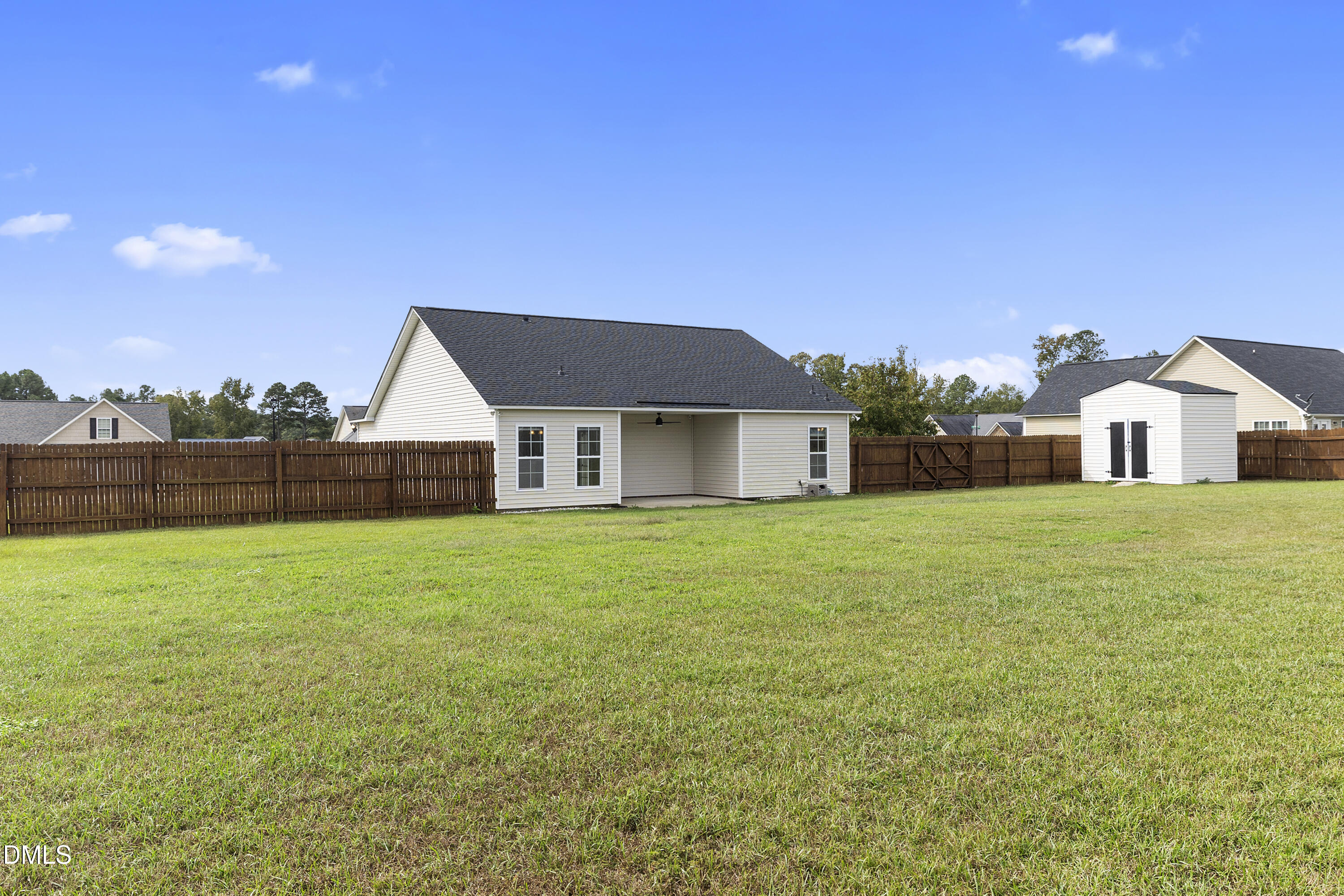 298 Declaration Drive Raeford, NC 28376 - Photo 14 of 58 a front view of a house with garden