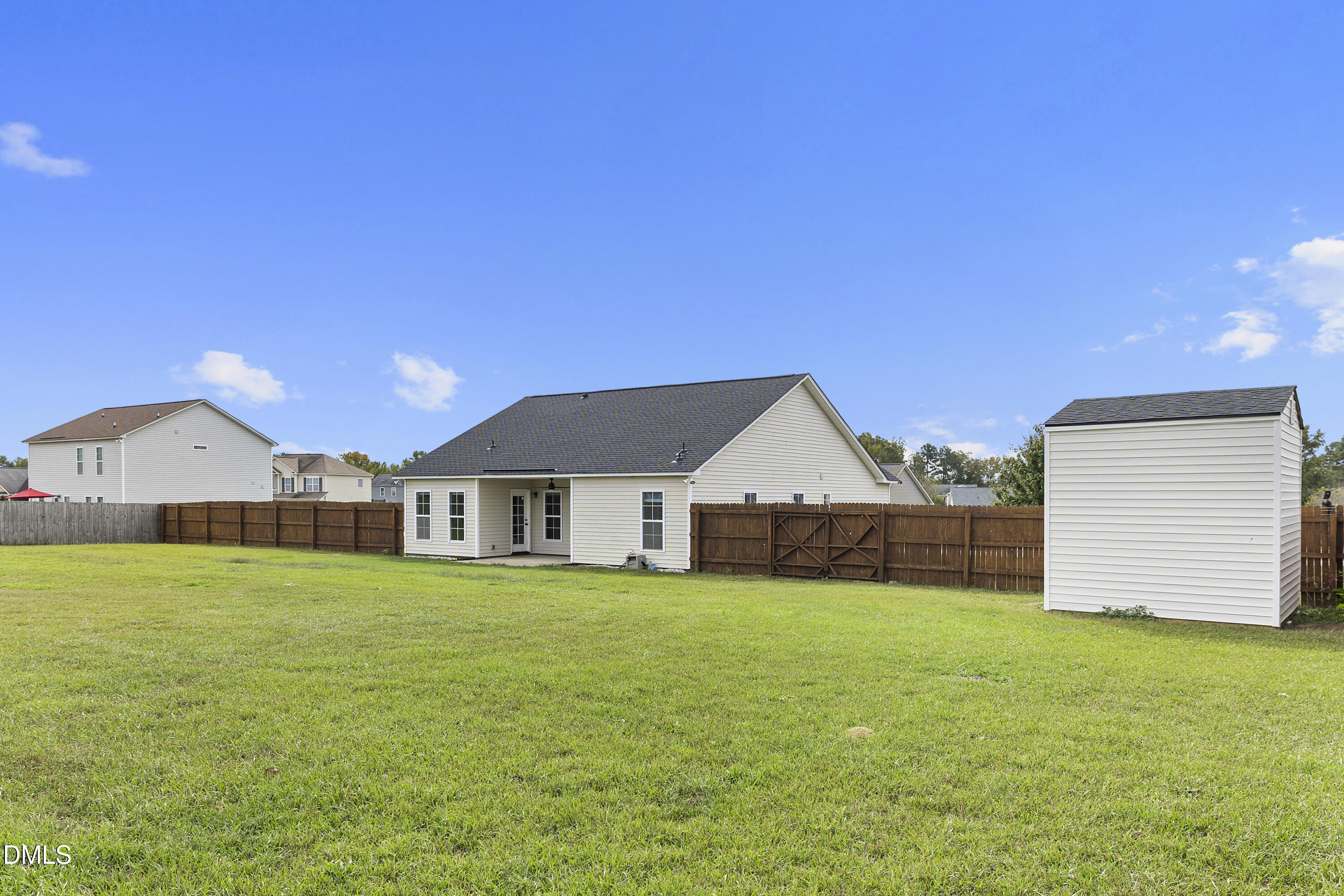 298 Declaration Drive Raeford, NC 28376 - Photo 16 of 58 a view of a yard in front of a house with a yard