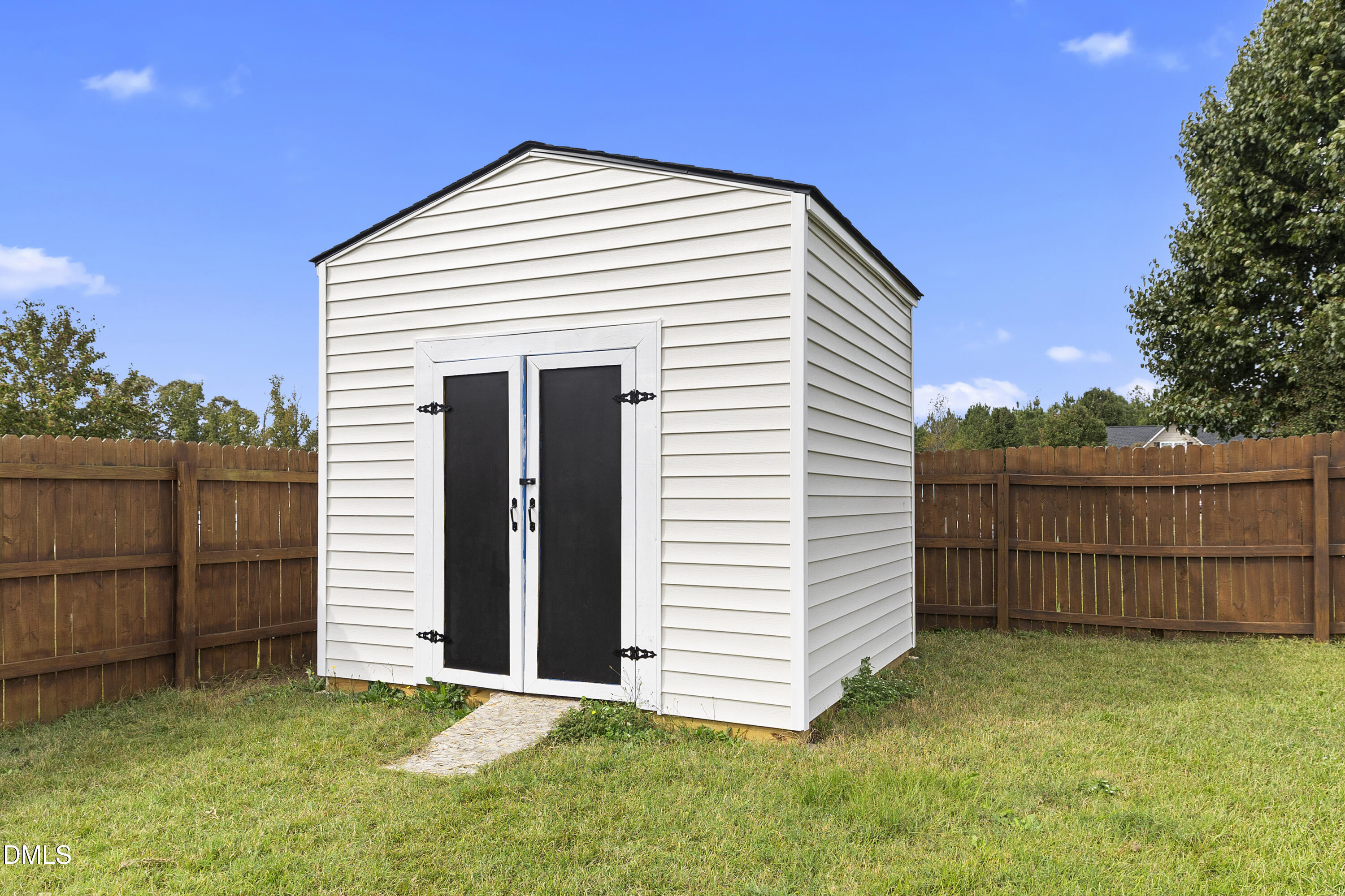 298 Declaration Drive Raeford, NC 28376 - Photo 18 of 58 a view of backyard with wooden fence