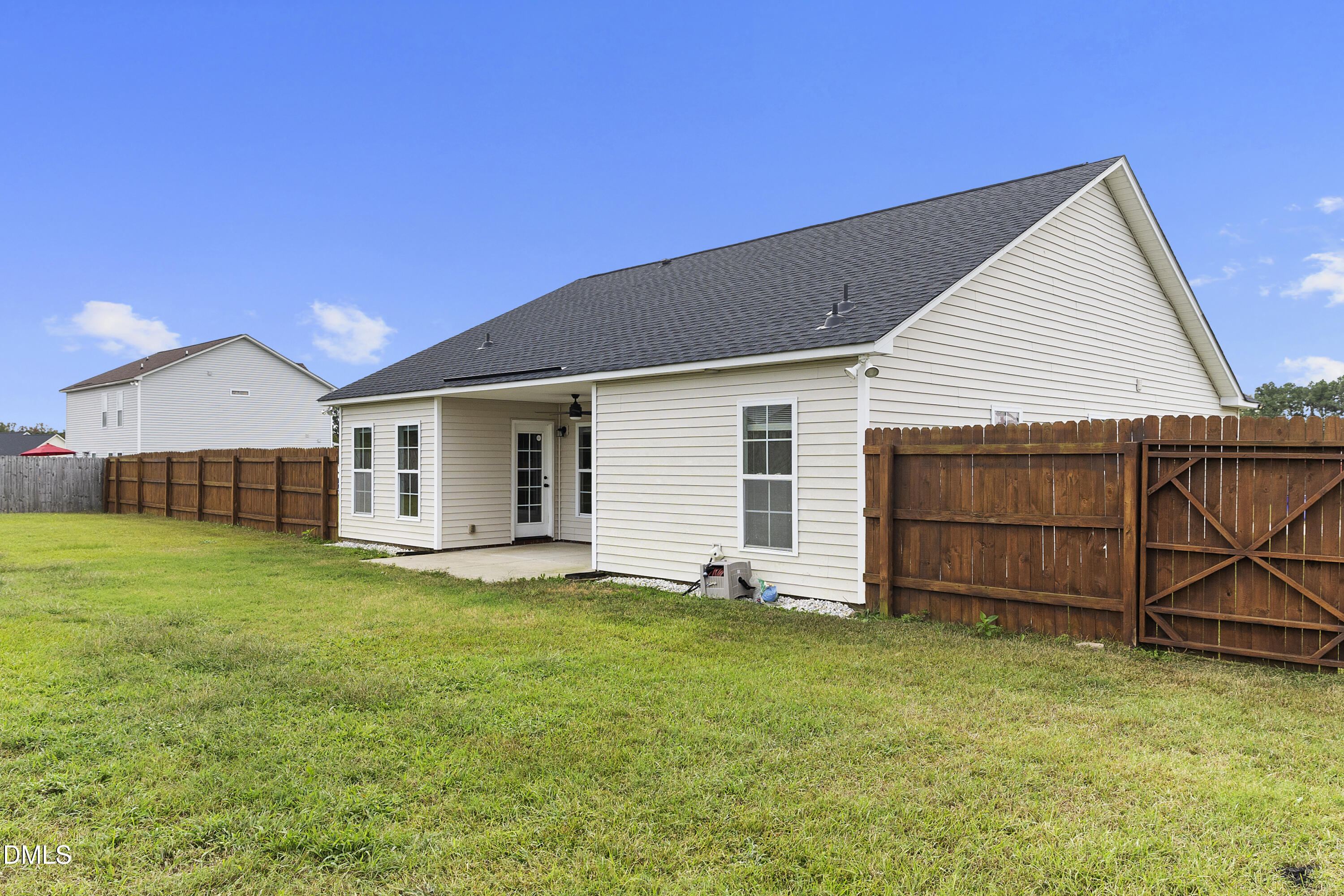 298 Declaration Drive Raeford, NC 28376 - Photo 20 of 58 a view of a house with a backyard