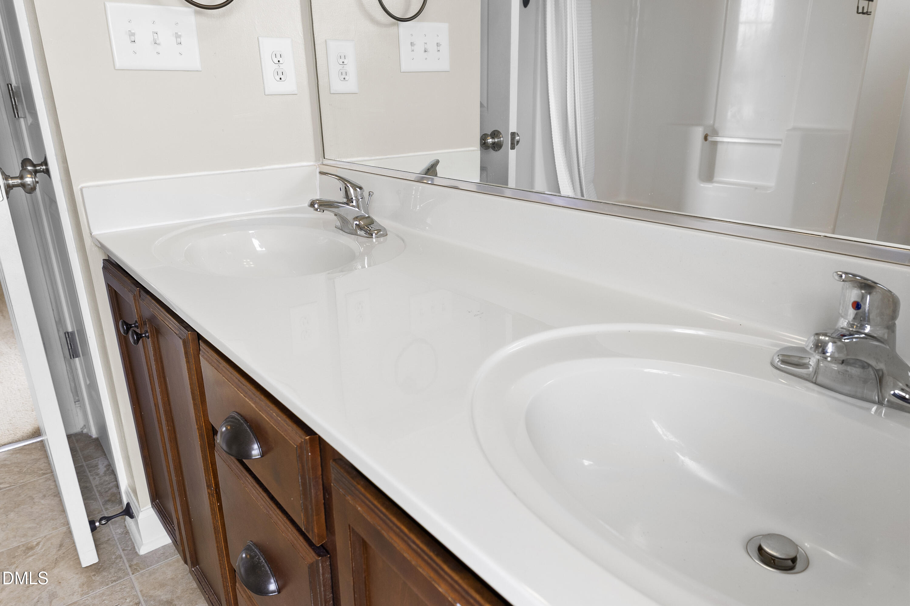 298 Declaration Drive Raeford, NC 28376 - Photo 22 of 58 a bathroom with a tub sink and mirror