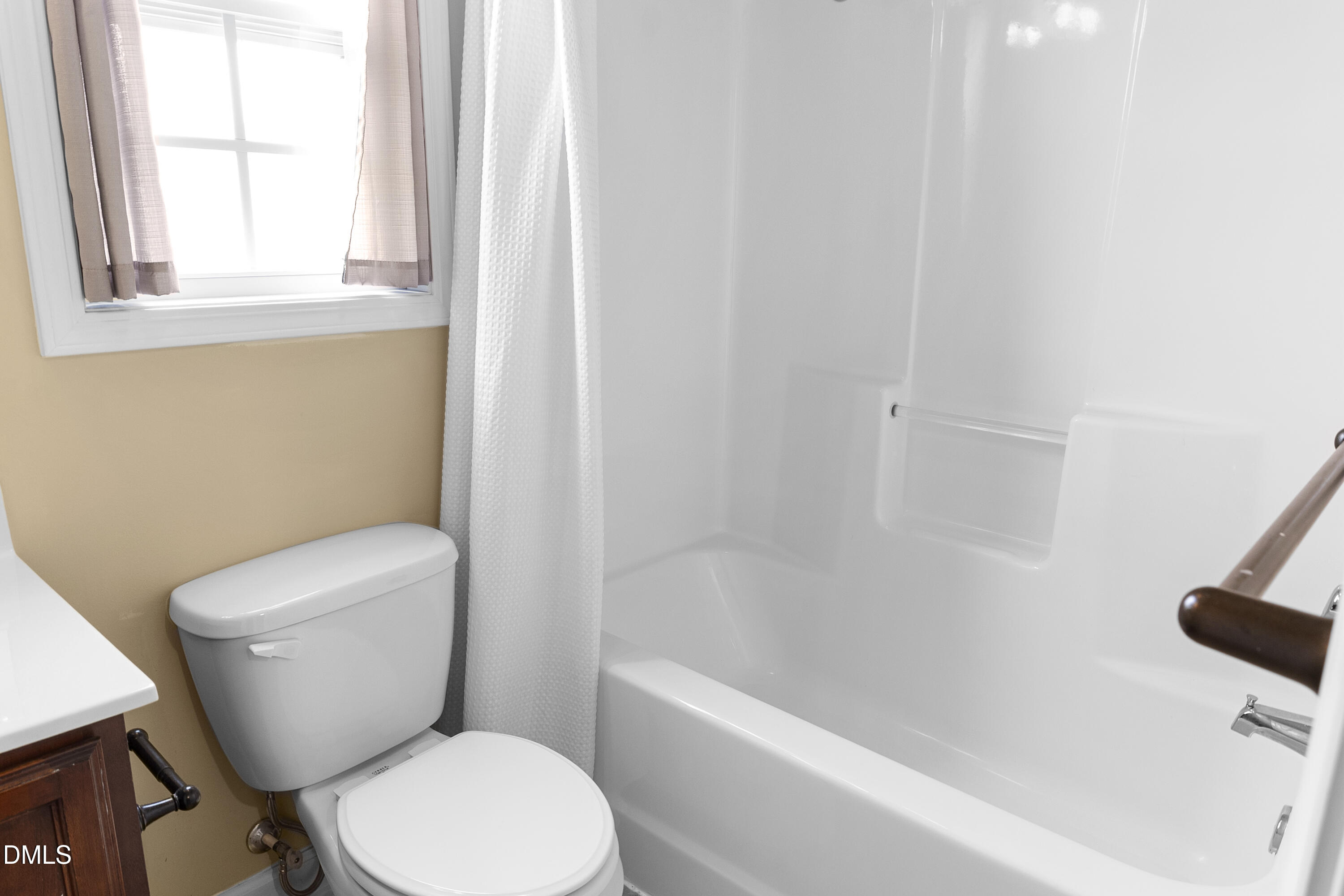 298 Declaration Drive Raeford, NC 28376 - Photo 26 of 58 a white toilet sitting next to a bath tub