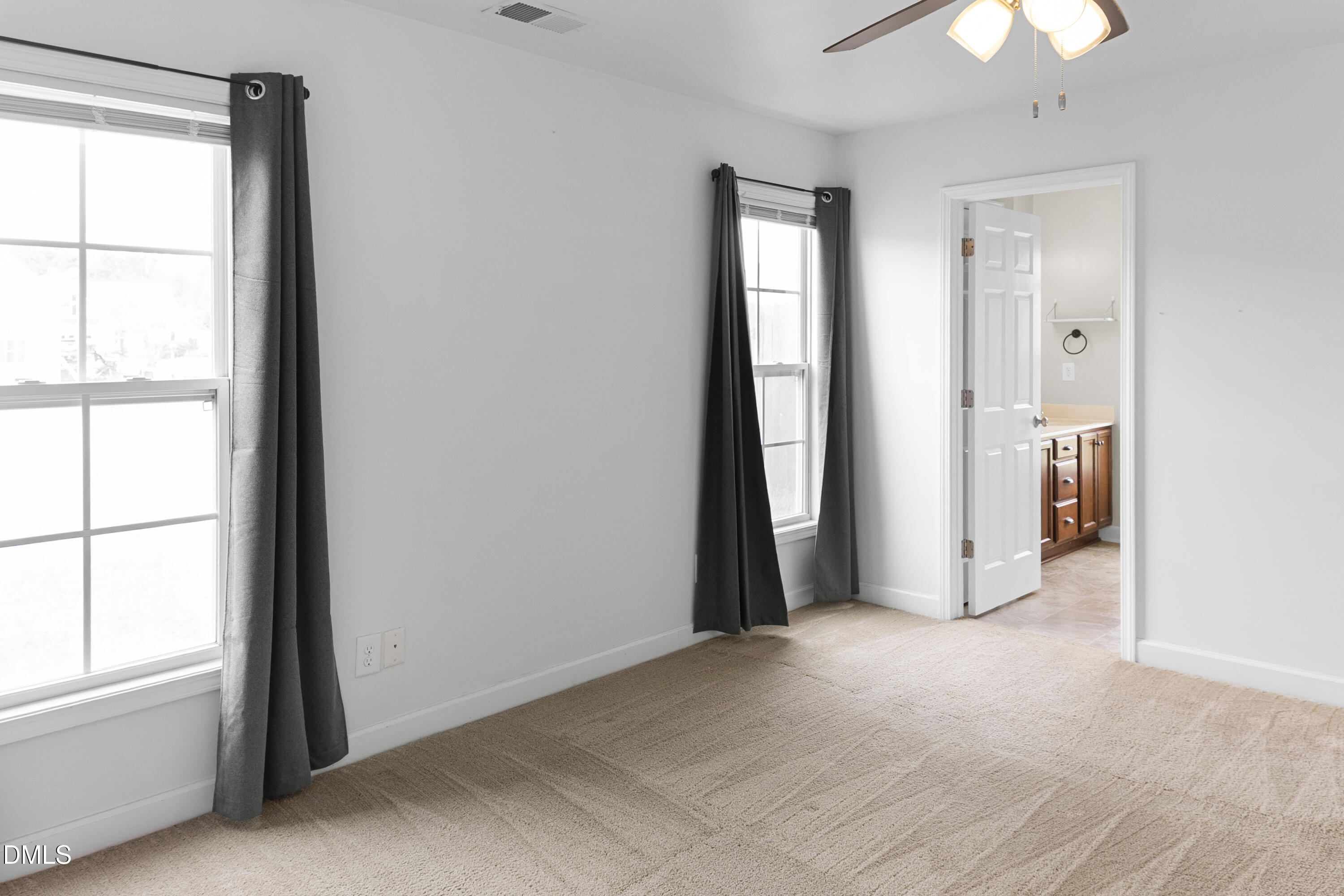 298 Declaration Drive Raeford, NC 28376 - Photo 27 of 58 a view of empty room with a window and chandelier fan
