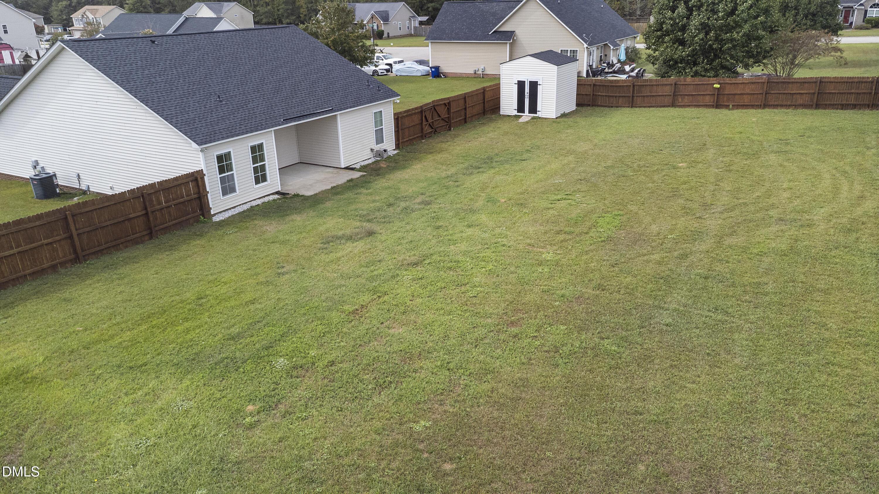298 Declaration Drive Raeford, NC 28376 - Photo 52 of 58 a view of a house with a yard
