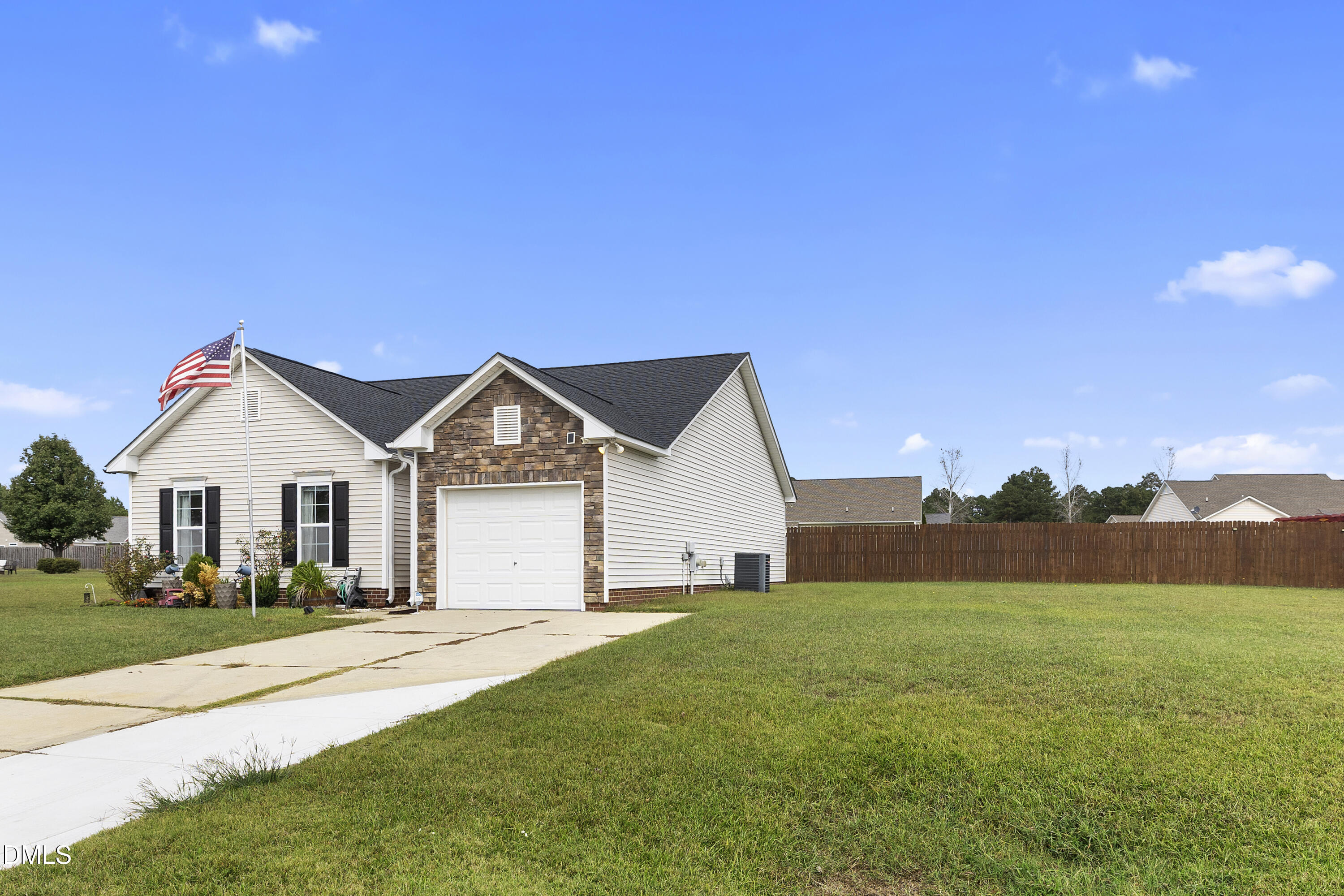 298 Declaration Drive Raeford, NC 28376 - Photo 7 of 58 a front view of a house with yard and green space
