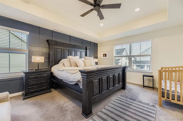 a bed room with a bed and a window