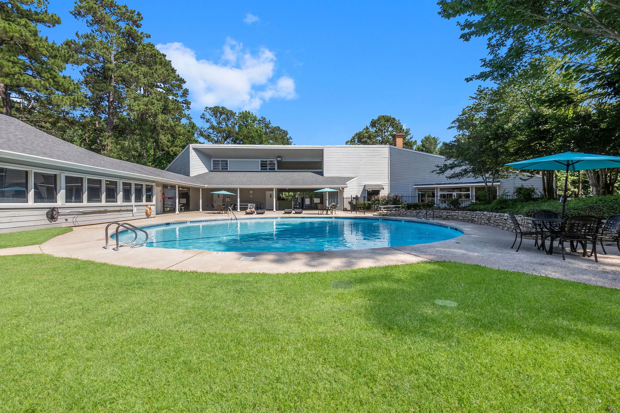 2 Clearwater Circle Coldspring, TX 77331 - Photo 13 of 14 a view of a house with a yard patio and swimming pool