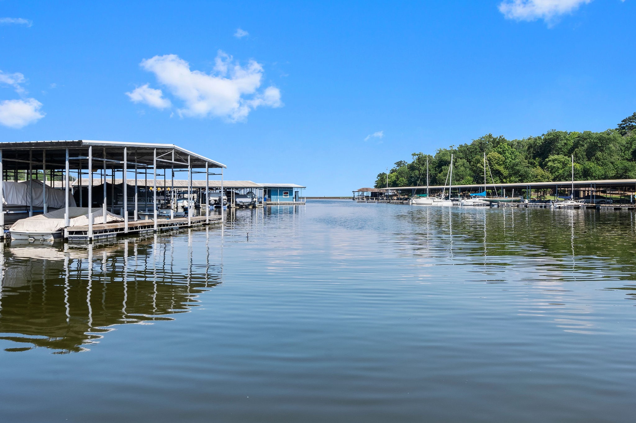 2 Clearwater Circle Coldspring, TX 77331 - Photo 7 of 14 a view of a lake with houses