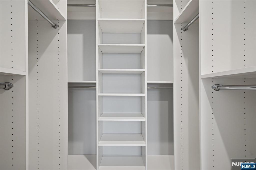 108 Montgomery Street Bloomfield, NJ 07003 - Photo 17 of 31 a view of walk in closet with empty racks