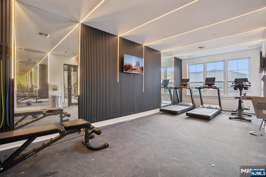 108 Montgomery Street Bloomfield, NJ 07003 - Photo 19 of 31 a view of a room with gym equipment