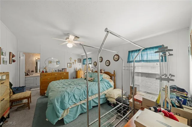 a bedroom with furniture and a bed