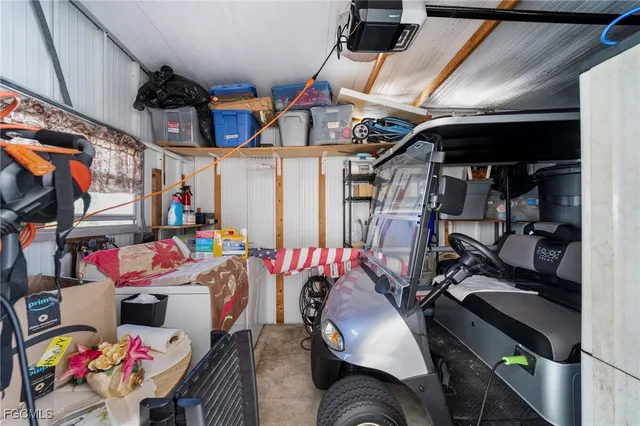 a view of a patio with a table and chairs
