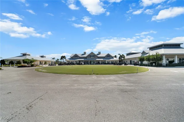 a view of outdoor space pool water and green space
