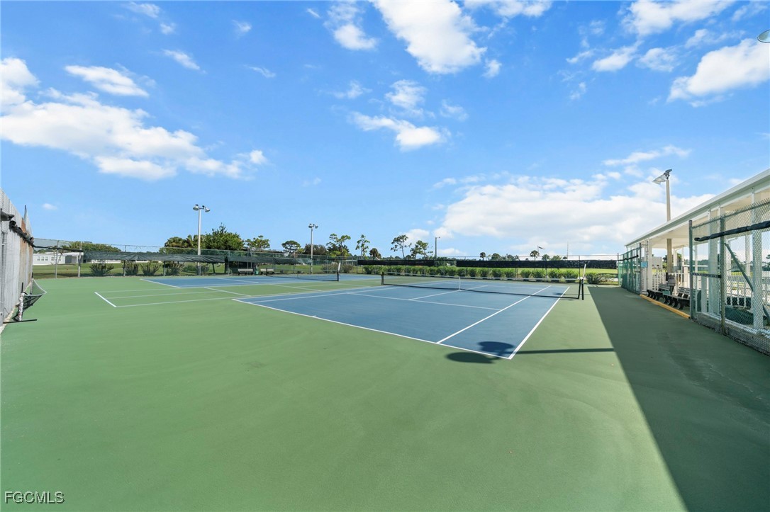 370 Nicklaus Boulevard North Fort Myers, FL 33903 - Photo 27 of 30 a view of outdoor space pool water and green space