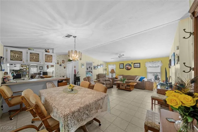 a kitchen with stainless steel appliances granite countertop cabinets and stove top oven