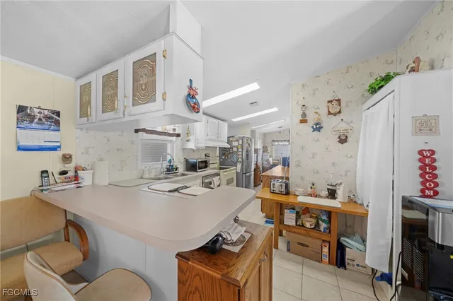 a view of a kitchen with a sink