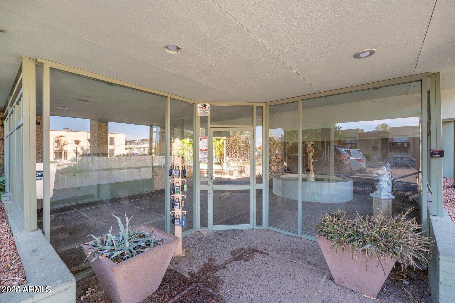 1702 West Tuckey Lane, Unit 111 Phoenix, AZ 85015 - Photo 11 of 16 1702 GATED FRONT