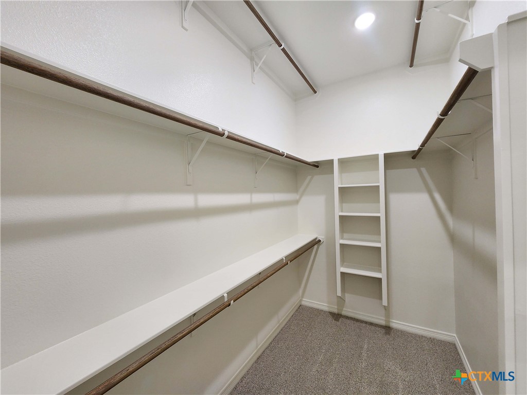 406 Talon Loop Salado, TX 76571 - Photo 22 of 31 a view of an empty walk in closet