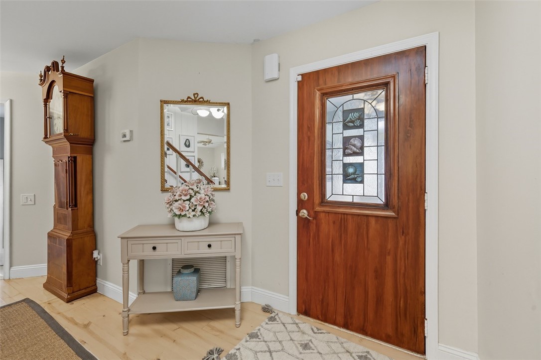 902 Tides Road Vero Beach, FL 32963 - Photo 11 of 25 a front door with wooden floor