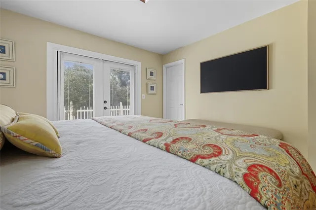 a bathroom with a granite countertop sink a vanity and a window