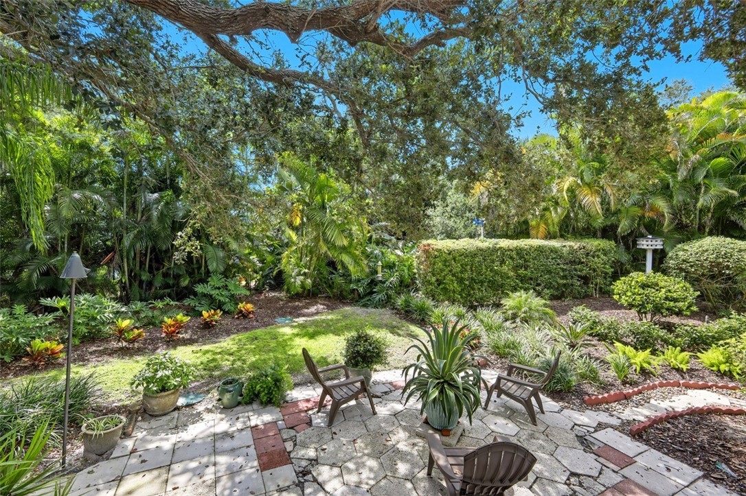 902 Tides Road Vero Beach, FL 32963 - Photo 22 of 25 a view of a garden with plants
