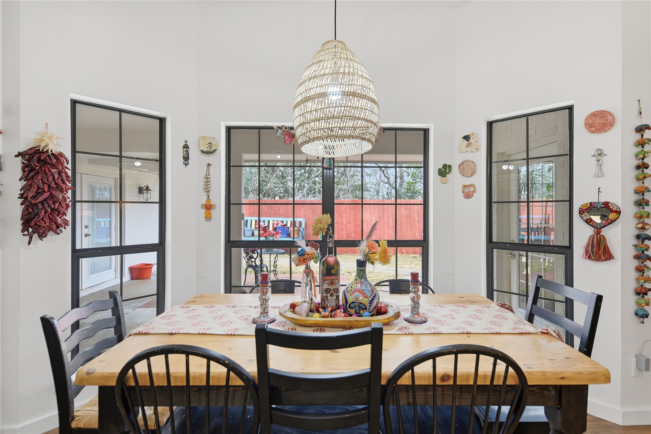 540 Hickory Creek Road Bellville, TX 77418 - Photo 14 of 49 a dining room with furniture a rug and a chandelier